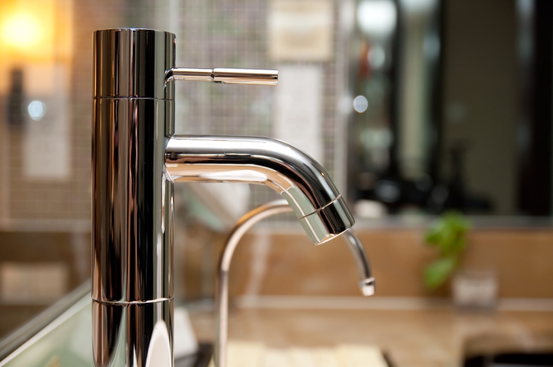 Leaking tap being repaired in Worcester Park